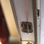front door dead bolt strike plate screw